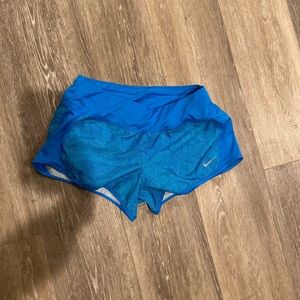 Running shorts, super cute for sports or athletic activities.